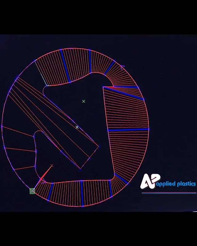 CAD wireframe cross-section of an extrusion die profile on screen