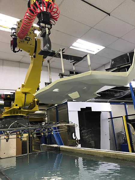 Process Robot Closeup Dipping Part