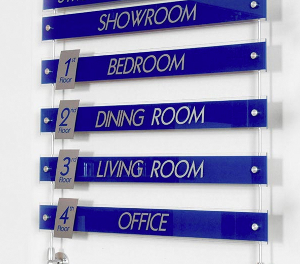 ADA exam room sign with Braille